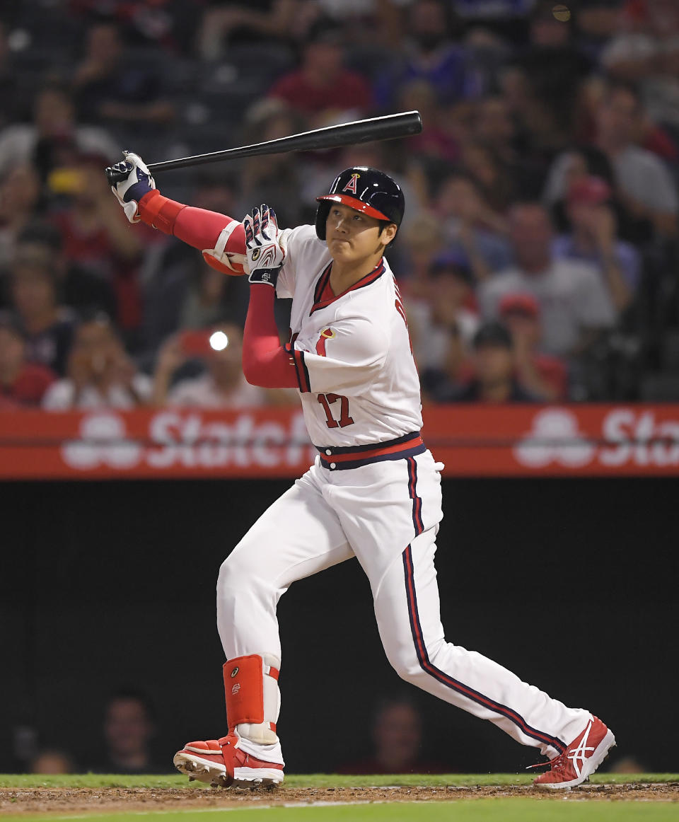 Los Angeles Angels' Shohei Ohtani, of Japan, lines out during the second inning of a baseball game against the Colorado Rockies, Monday, Aug. 27, 2018, in Anaheim, Calif. (AP Photo/Mark J. Terrill)