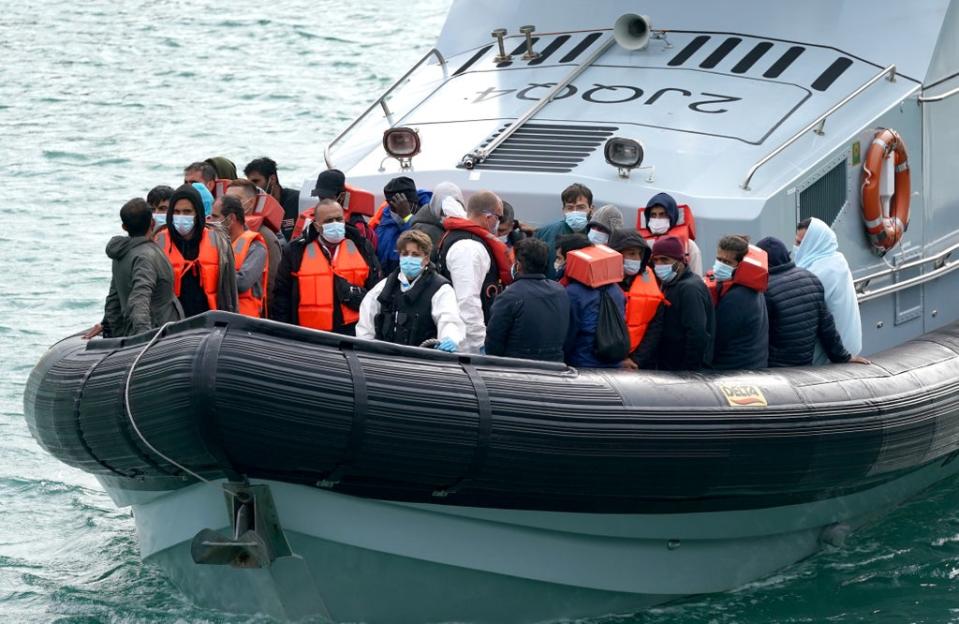 A group of people thought to be migrants are brought in to Dover (Gareth Fuller/PA) (PA Wire)