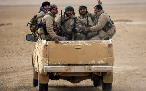 Kurdish and Arab fighters will make up the 30,000-strong border force - Credit: AFP