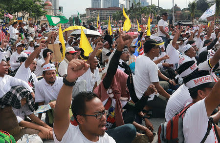 FILE PHOTO: People take part in an Anti-ICERD (International Convention on the Elimination of All Forms of Racial Discrimination) mass rally in Kuala Lumpur, Malaysia, December 8, 2018. REUTERS/Sadiq Asyraf