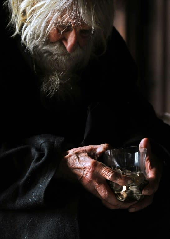 The hunched figure in a threadbare coat and peasant sandals holding a cup for donations was a regular sight at the entrance to Sofia's cathedral