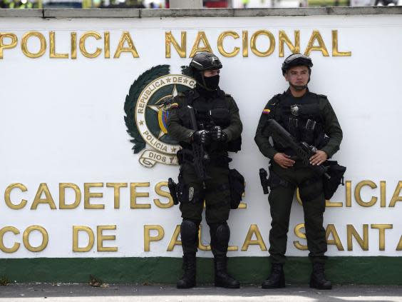 There is now a huge security presence at the police barracks (AFP)