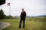 Cattle rancher Arlene Mackay poses at her ranch in Avon