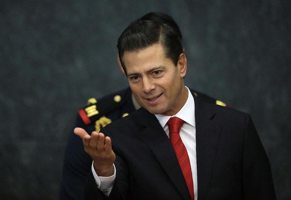 Mexico's President Enrique Pena Nieto holds a press conference at Los Pinos presidential residence in Mexico City, Monday, Jan. 23, 2017. Pena Nieto said Monday that Mexico's attitude towards the Donald Trump administration should not be aggressive or biased, but one of dialogue. (AP Photo/Marco Ugarte)