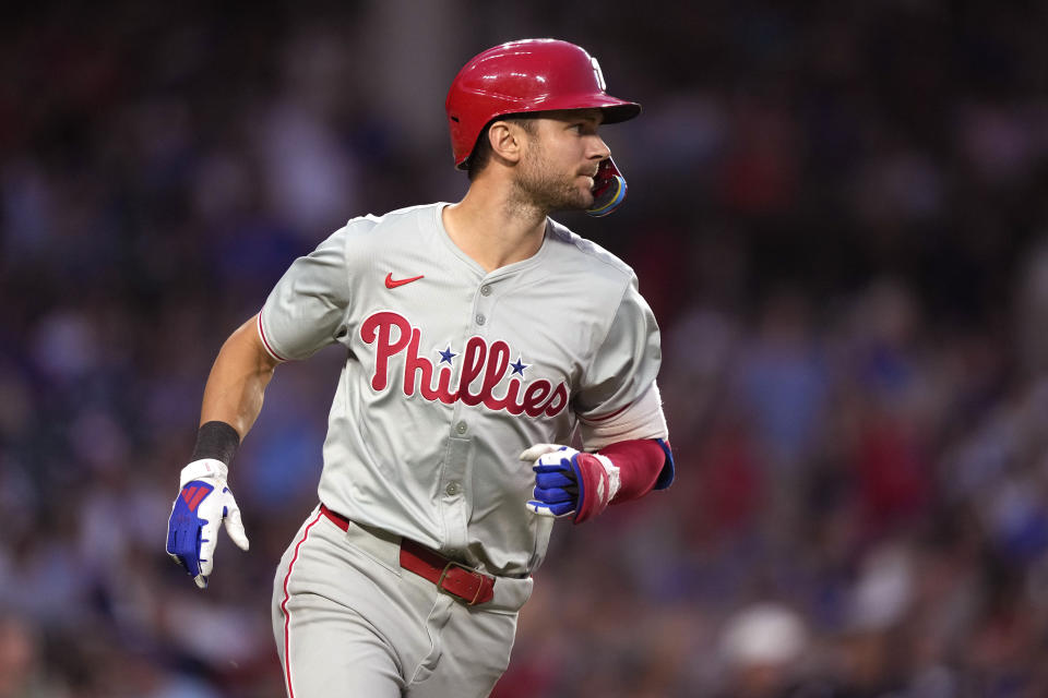 Philadelphia Phillies' Trea Turner watches his two-run home run off Chicago Cubs starting pitcher Hayden during the fifth inning of a baseball game Tuesday, July 2, 2024, in Chicago. (AP Photo/Charles Rex Arbogast)