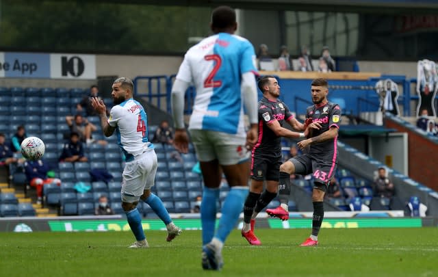 Mateusz Klich (right) scores his side’s third goal (