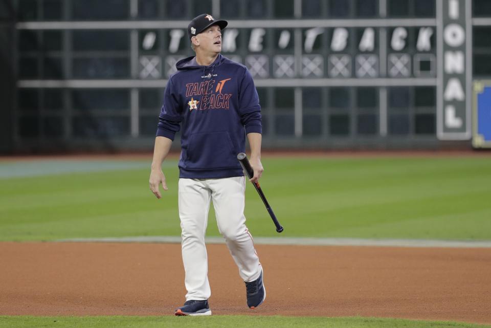 FILE - In this Oct. 30, 2019, file photo, Houston Astros manager AJ Hinch watches batting practice before Game 7 of baseball's World Series against the Washington Nationals in Houston. The Detroit Tigers have hired AJ Hinch to be their new manager, giving him a chance to return to a major league dugout after he was fired by Houston in the wake of the Astros’ sign-stealing scandal. (AP Photo/David J. Phillip, File)