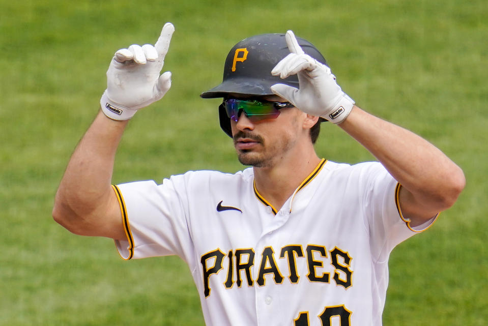 Pittsburgh Pirates' Bryan Reynolds celebrates as he crosses home plate after hitting a solo home run off Chicago Cubs starting pitcher Alec Mills during the second inning of a baseball game in Pittsburgh, Thursday, Sept. 24, 2020. (AP Photo/Gene J. Puskar)