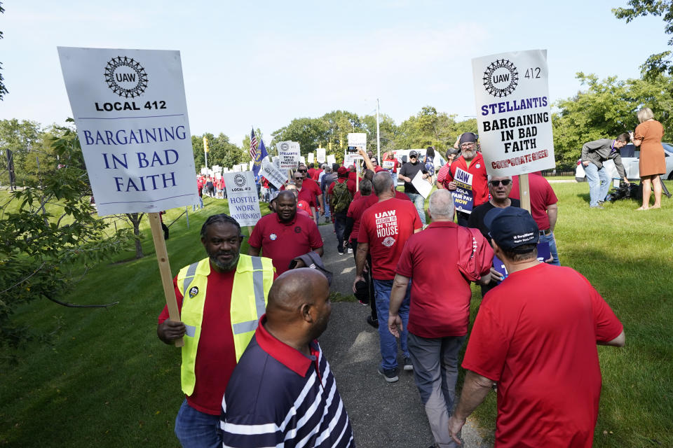 United Auto Workers march outside the Stellantis North American Headquarters, Wednesday, Sept. 20, 2023, in Auburn Hills, Mich. (AP Photo/Carlos Osorio)