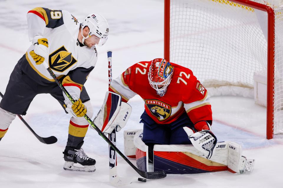 Florida Panthers goaltender Sergei Bobrovsky (72) blocks a shot from Vegas Golden Knights center Ivan Barbashev (49) during a game in March.