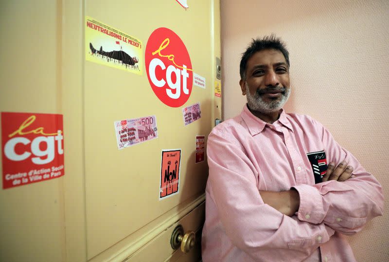 Patrick Martine poses at one of his CGT trade union's branch offices in Paris