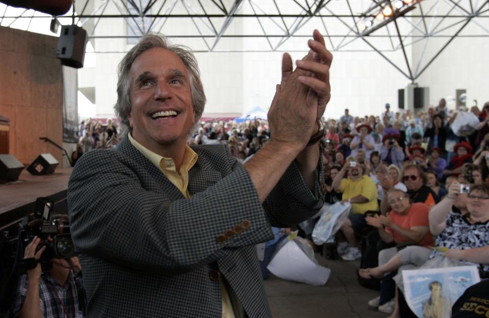 Henry Winkler, shown in 2018, welcomes the public at the Marcus Performing Arts Center for the dedication of "The Bronz Fonz," a statue commemorating him and "Happy Days."