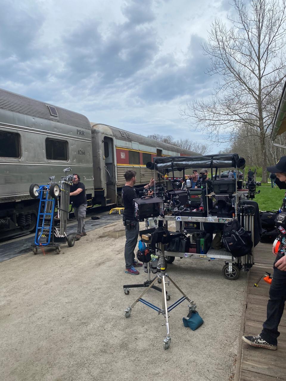 Film crews from the movie "A Man called Otto" prepare for a scene using cars from the Cuyahoga Valley Scenic Railroad.