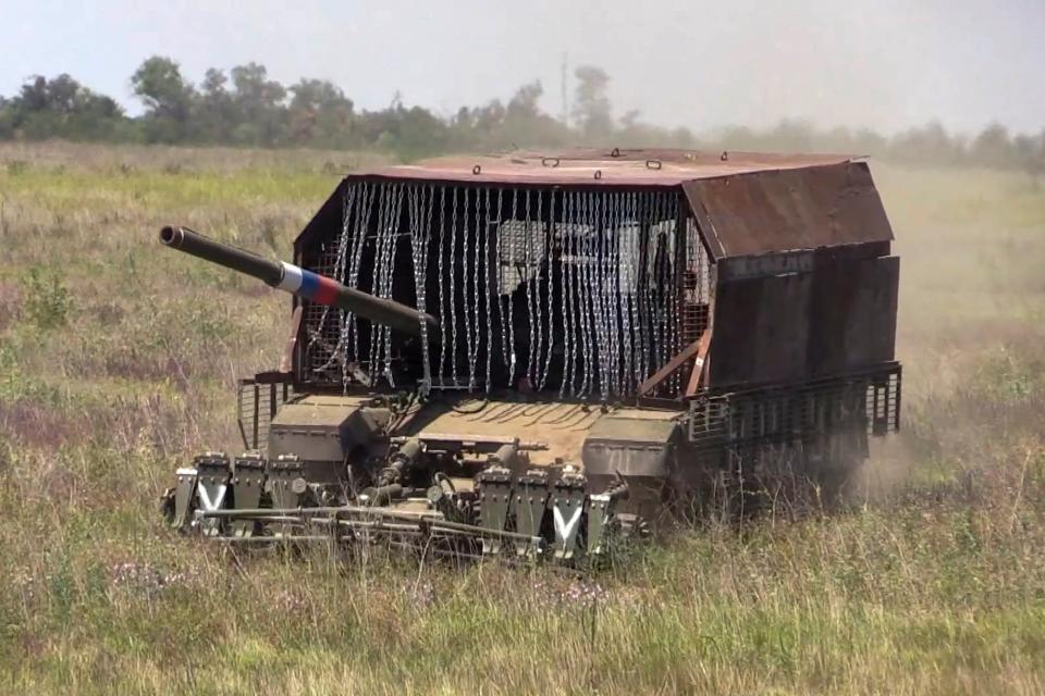 In this photo taken from video released by the Russian Defense Ministry on Tuesday, July 23, 2024, Russian tank T-80BVM drives in an undisclosed location (AP)