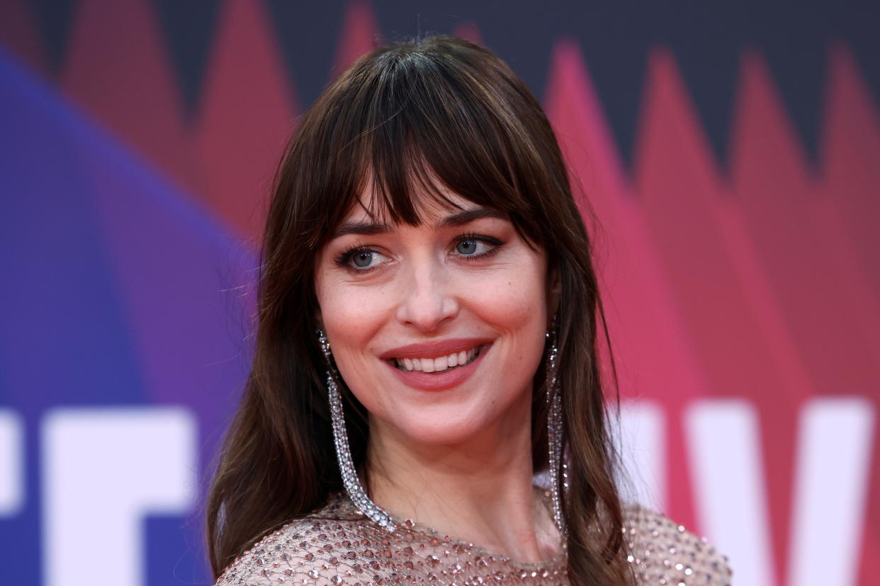 Cast member Dakota Johnson arrives at the premiere of 'The Lost Daughter' during the BFI film festival in London, Britain, October 13, 2021. REUTERS/Henry Nicholls