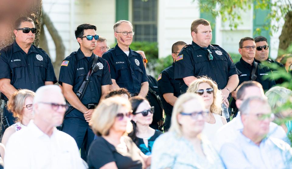Firefighters from Newtown and Upper Makefield stand at the memorial service for the 2023 fatal flood victims at The Crossing Church in Washington Crossing on Monday, July 15, 2024.