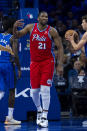 Philadelphia 76ers' Joel Embiid reacts after the shot during the first half of an NBA basketball game against the Orlando Magic, Friday, April 12, 2024, in Philadelphia. (AP Photo/Chris Szagola)