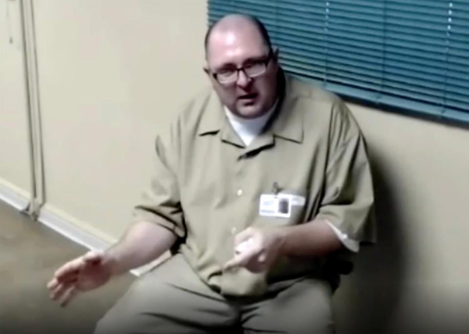 Michael Carneal gestures as he speaks during a meeting with the parole board on Tuesday, September 20.  Carneal murdered three students and injured several more at a Paducah high school on December 1, 1997.