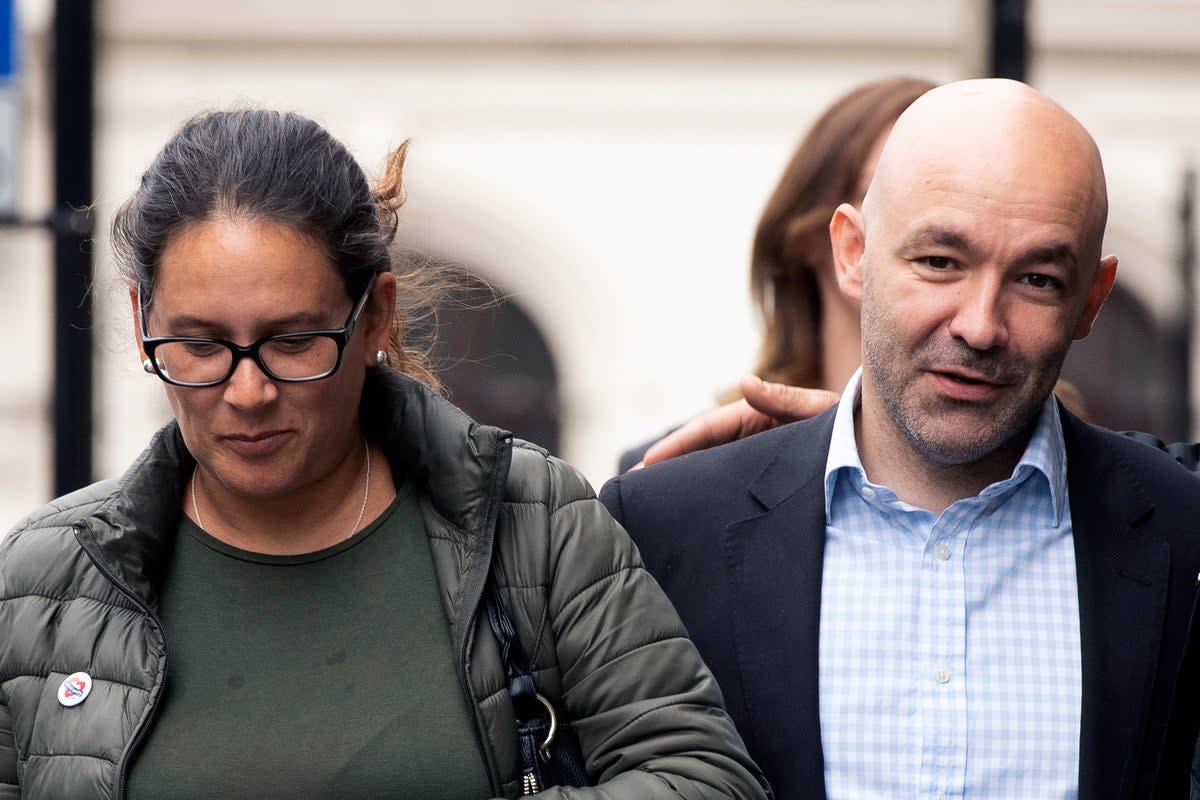 Marcio Gomes and his wife Andreia Perestrelo (EPA)