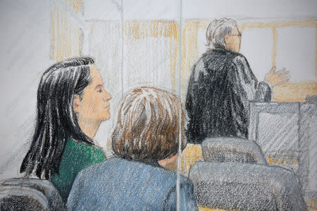 Huawei CFO Meng Wanzhou (L), who was arrested on an extradition warrant, appears at her B.C. Supreme Court bail hearing in a drawing in Vancouver, British Columbia, Canada December 7, 2018. REUTERS/Jane Wolsak