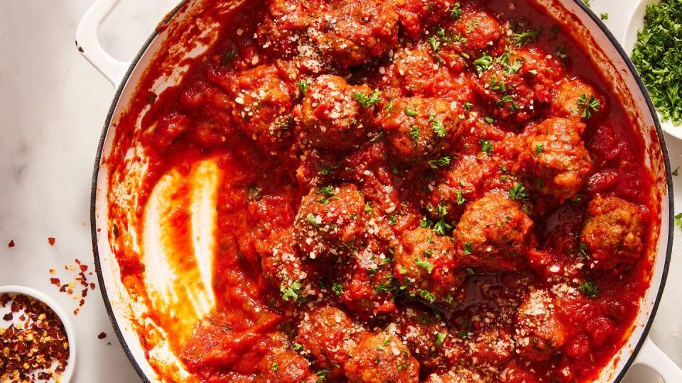 homemade italian meatballs in marinara with herbs