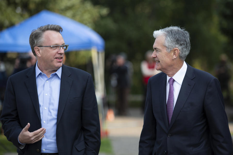 New York Fed President John Williams and Fed Chair Jerome Powell walk together outside at the Jackson Hole Economic Policy Symposium.