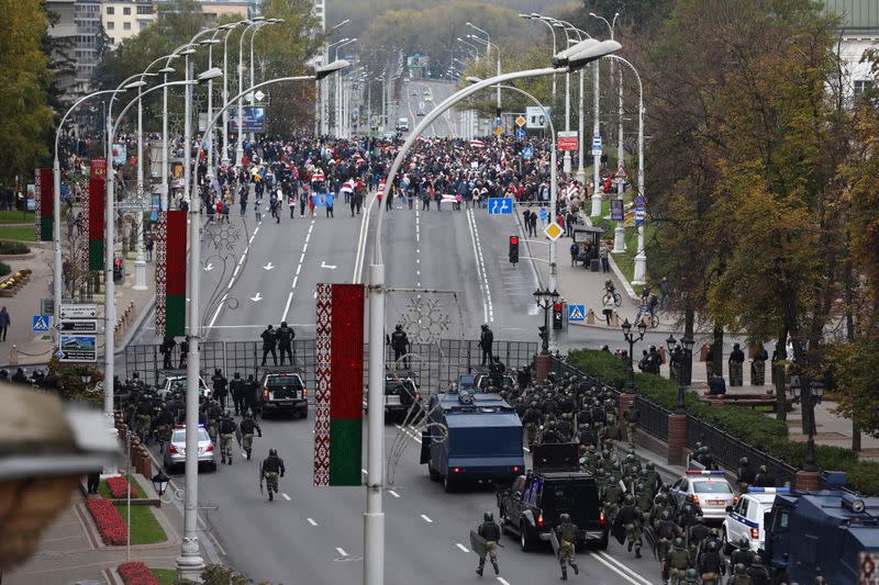 Belarusian opposition supporters hold a rally in Minsk