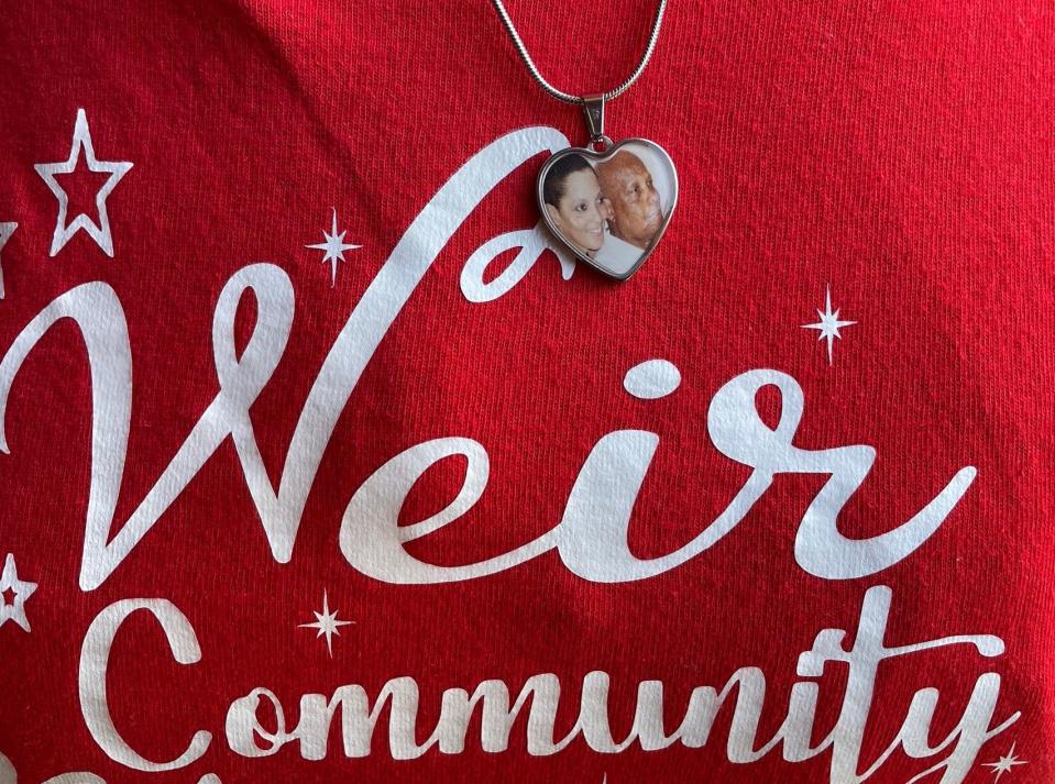 Tracey Weir wore a locket with a photo of her and her dad, James, who died in January.