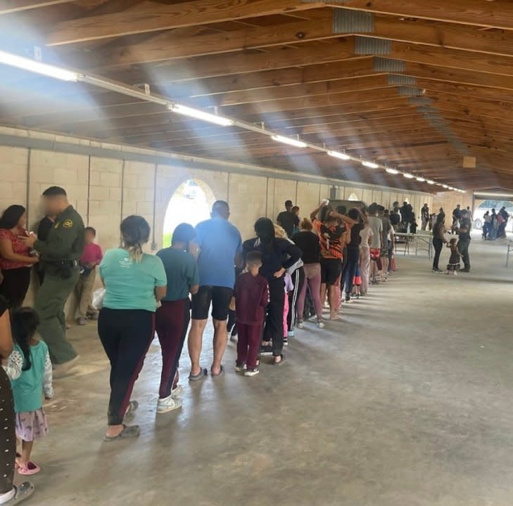 A line of undocumented migrants are seen being processed on Sept. 28, 2023 in Brownsville, part of the Rio Grande Valley Sector, after illegally crossing from Mexico. (Courtesy Border Patrol)