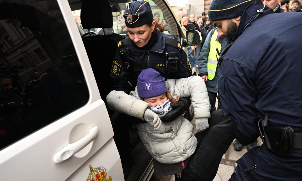 <span>Arrests and prosecutions of non-violent protesters, such as Greta Thunberg in Sweden, are common and increasing.</span><span>Photograph: Fredrik Sandberg/EPA</span>