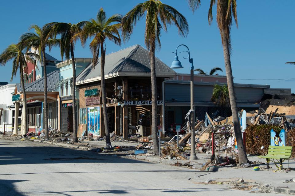 Wreckage as seen on Fort Myers Beach on Oct. 8, 2022. Hurricane Ian rammed into the region last moth, causing government agencies to close most beaches to the public.