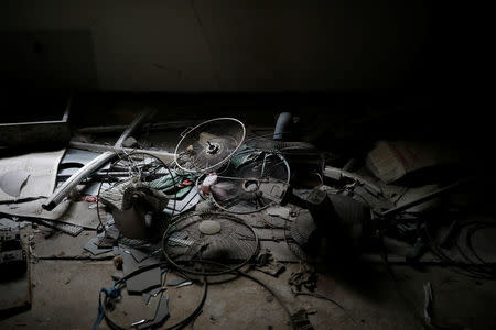 Broken fans lie on the ground at the abandoned Alps Ski Resort located near the demilitarised zone separating the two Koreas in Goseong, South Korea, January 17, 2018. REUTERS/Kim Hong-Ji