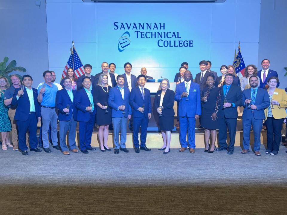 Officials from Hyundai, Savannah Technical College and more were all smiles during a champaign toast celebrating the new Electric Vehicle Professional certificate.