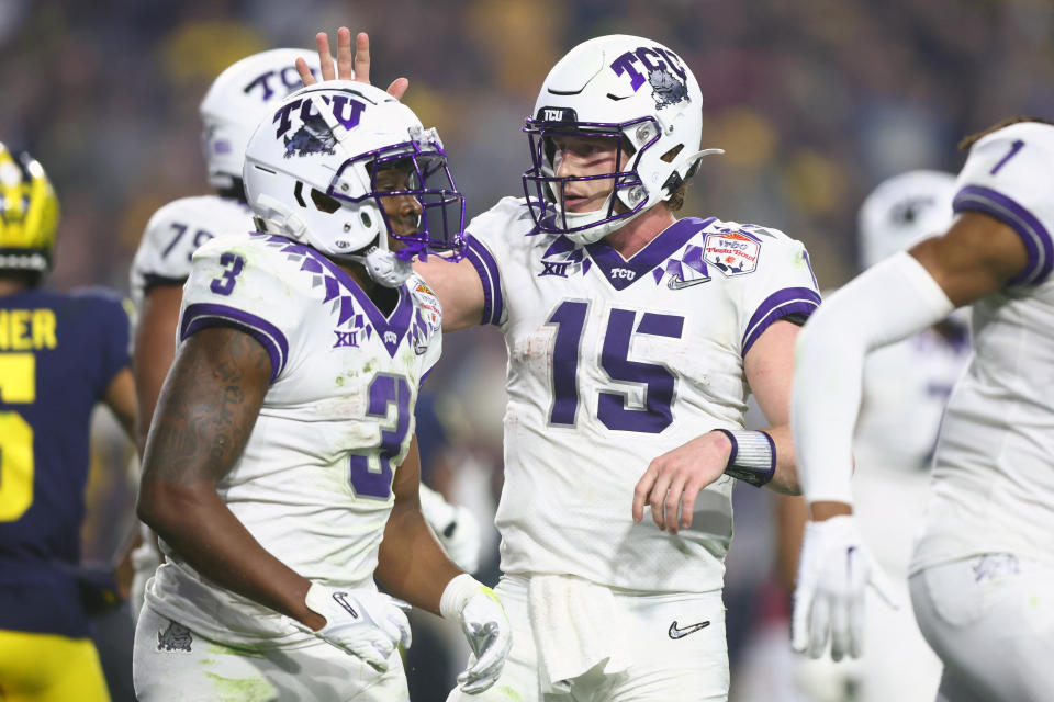 TCU quarterback Max Duggan (15) has played a starring role in his team's magical season, and he made some key plays in TCU's thrilling 51-45 win over Michigan in Saturday's College Football Playoff semifinal. (Mark J. Rebilas-USA TODAY Sports)
