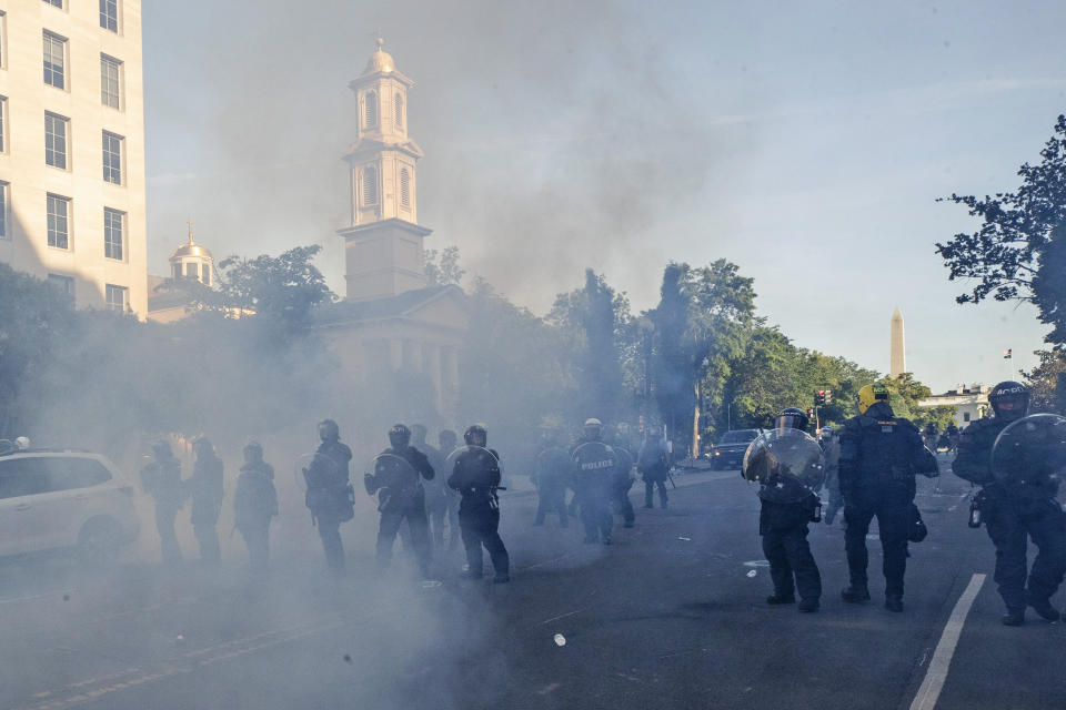 Police move demonstrators away from St. John's Church across Lafayette Park from the White House on June 1, 2020. (Alex Brandon / AP file)