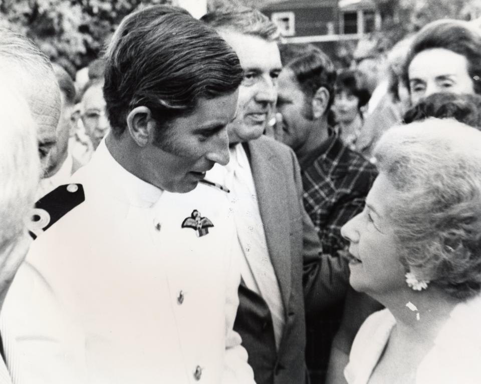 Dashing in his 1970s sideburns, Prince Charles greets the crowd assembled near Strawbery Banke in Portsmouth.