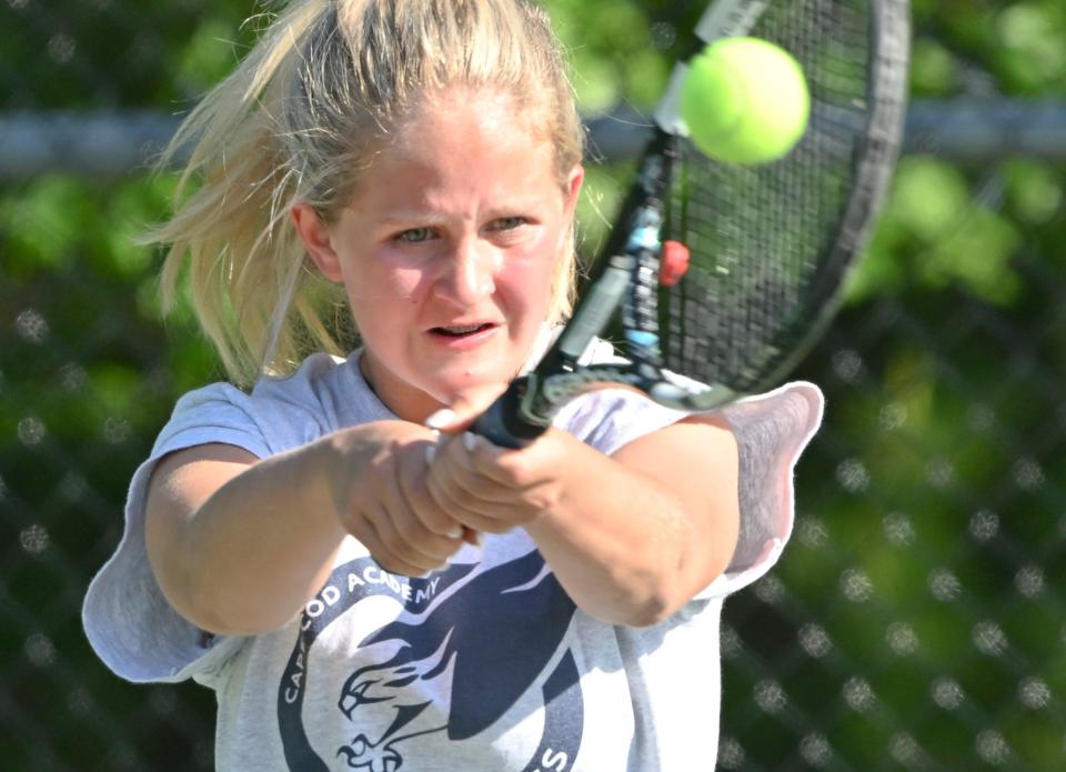 OSTERVILLE   5/31/23    Cape Cod Academy number two singles player Bella Scioletti backhands a shot at her Watertown opponent.