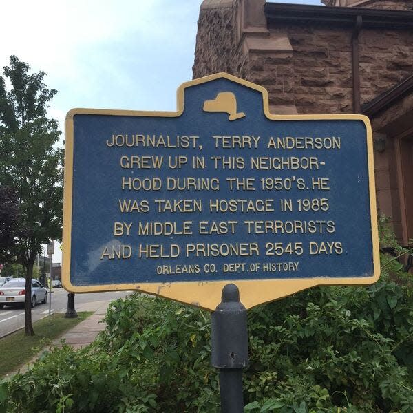 A historical marker in Albion that notes Terry Anderson grew up in that Orleans County community.