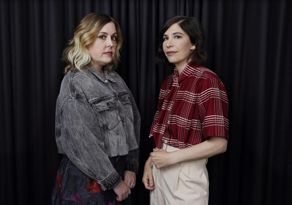 Carrie Brownstein, right, and Corin Tucker of the band Sleater-Kinney pose for a portrait in Los Angeles on Monday, Sept. 25, 2023, to promote their album "Little Rope." (AP Photo/Chris Pizzello)