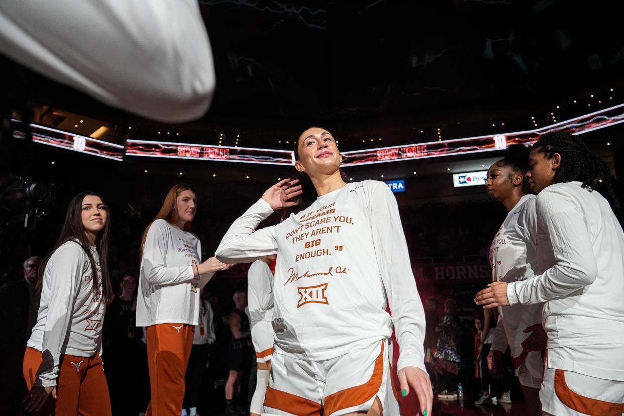 Texas senior guard Shay Holle takes the court ahead of the Longhorns' game against Kansas State on Feb. 4. The former Westlake star has emerged as one of No. 5 Texas' most important pieces, a two-way player who works hard, practices harder and is the glue of the team, head coach Vic Schaefer said.