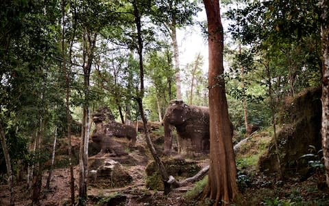 Predating the more famous Angkor Wat by 350 years, the roads, temples and carvings of Mahendraparvata are still being unearthed - Credit: &nbsp;NYTNS / Redux / eyevine