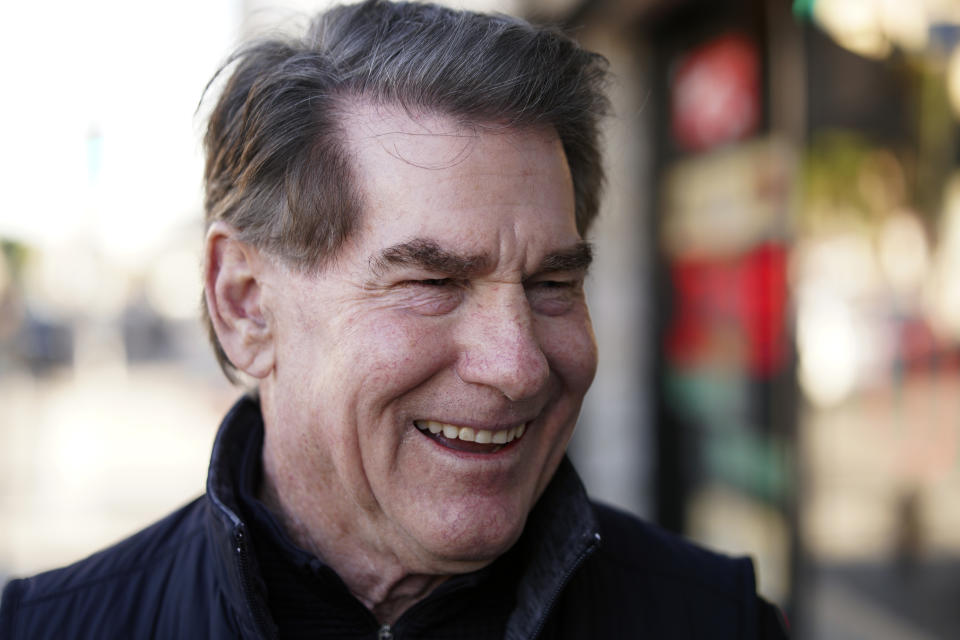 FILE - Former baseball player Steve Garvey talks to a local business owner during a visit to the Skid Row area of Los Angeles, on Jan. 11, 2024. The candidacy for the U.S. Senate of former California baseball star Garvey has brought a splash of celebrity to the race that has alarmed his Democratic rivals and tugged at the state's political gravity. (AP Photo/Richard Vogel, File)
