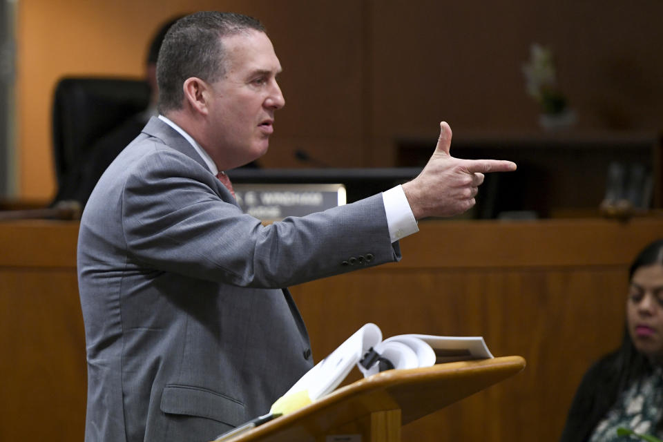 Deputy District Attorney John Lewin gestures during the second day of opening statements of Durst's murder trial at the Airport Branch Courthouse in Los Angeles during his murder trial at the Airport Branch Courthouse in Los Angeles on Thursday, March 5, 2020. After a Hollywood film about him, an HBO documentary full of seemingly damning statements, and decades of suspicion, Durst is now on trial for murder. In opening statements Thursday, prosecutors argued Durst killed his close friend Susan Berman before New York police could interview her about the 1982 disappearance of Durst's wife. (Robyn Beck/AFP via AP, Pool)