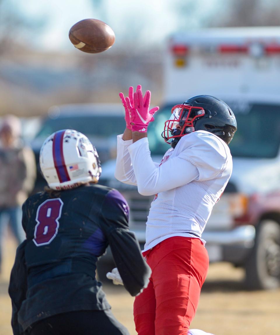 Froid/Medicine Lake's Javonne Nesbit makes a touchdown catch in Saturday's 6-player football championship against Power/Dutton/Brady in Dutton.