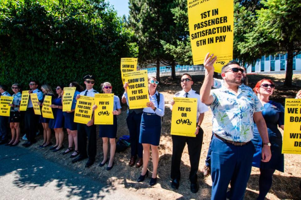 Alaska Airlines flight attendants on the picket line. (AvgeekJoe Productions/Flickr) AvgeekJoe Productions / Flickr