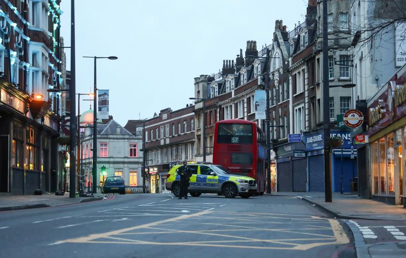 Police is seen near a site where a man was shot by armed officers in Streatham