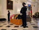 Maryland Senate President Emeritus Thomas V. Mike Miller, Jr. lies in state at the Maryland Statehouse in Annapolis, Md., on Friday, Jan. 22, 2021. Miller was a state legislator for 50 years. A Democrat, he served as president of the Maryland Senate for 33 years. He announced he was stepping down from the post in 2019, but he remained a senator until December. (Bill O'Leary/The Washington Post via AP, Pool)