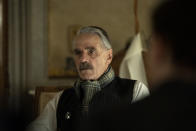 This image released by Netflix shows Jeremy Irons as Neville Chamberlain in a scene from "Munich: The Edge of War." (Frederic Batier/Netflix via AP)