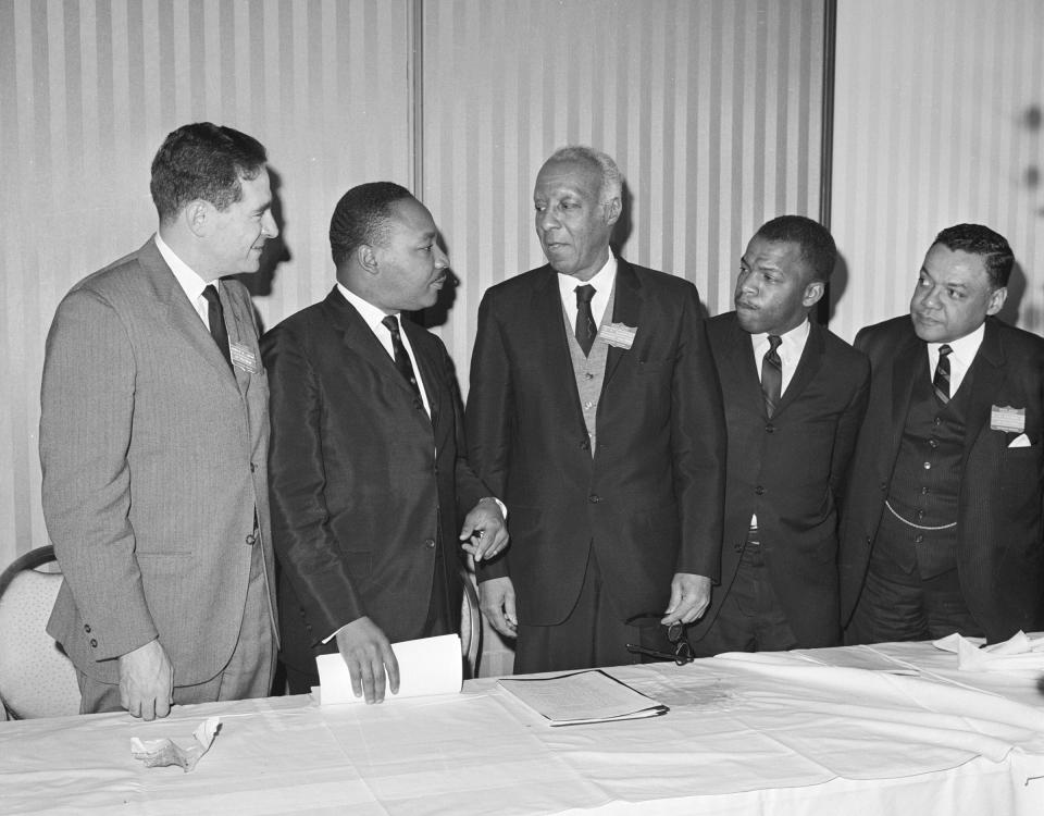 From left, Morris B. Abram, Rev. Martin Luther King, Jr., A. Philip Randolph, John Lewis and William T. Coleman take part the White House Conference on Civil Rights with a call for $100 billion "Freedom Budget".<span class="copyright">Bettmann Archive/Getty Images</span>