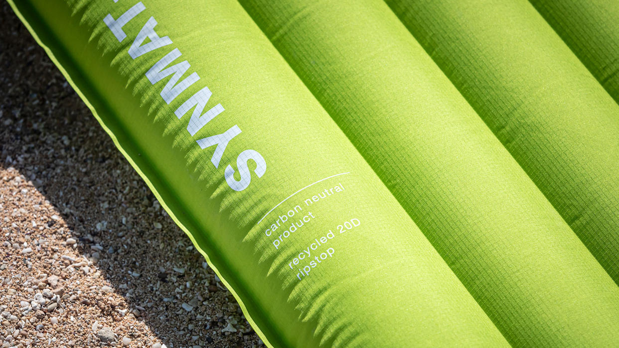  A close-up of a green Exped Ultra 3R sleeping mat. 